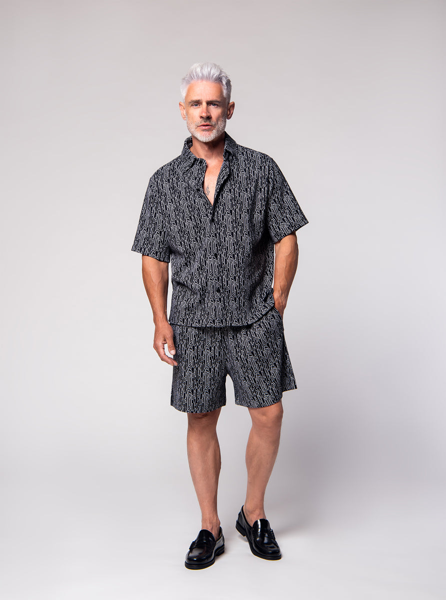 cotton jacquard short geometric motiv. black background, white motiv