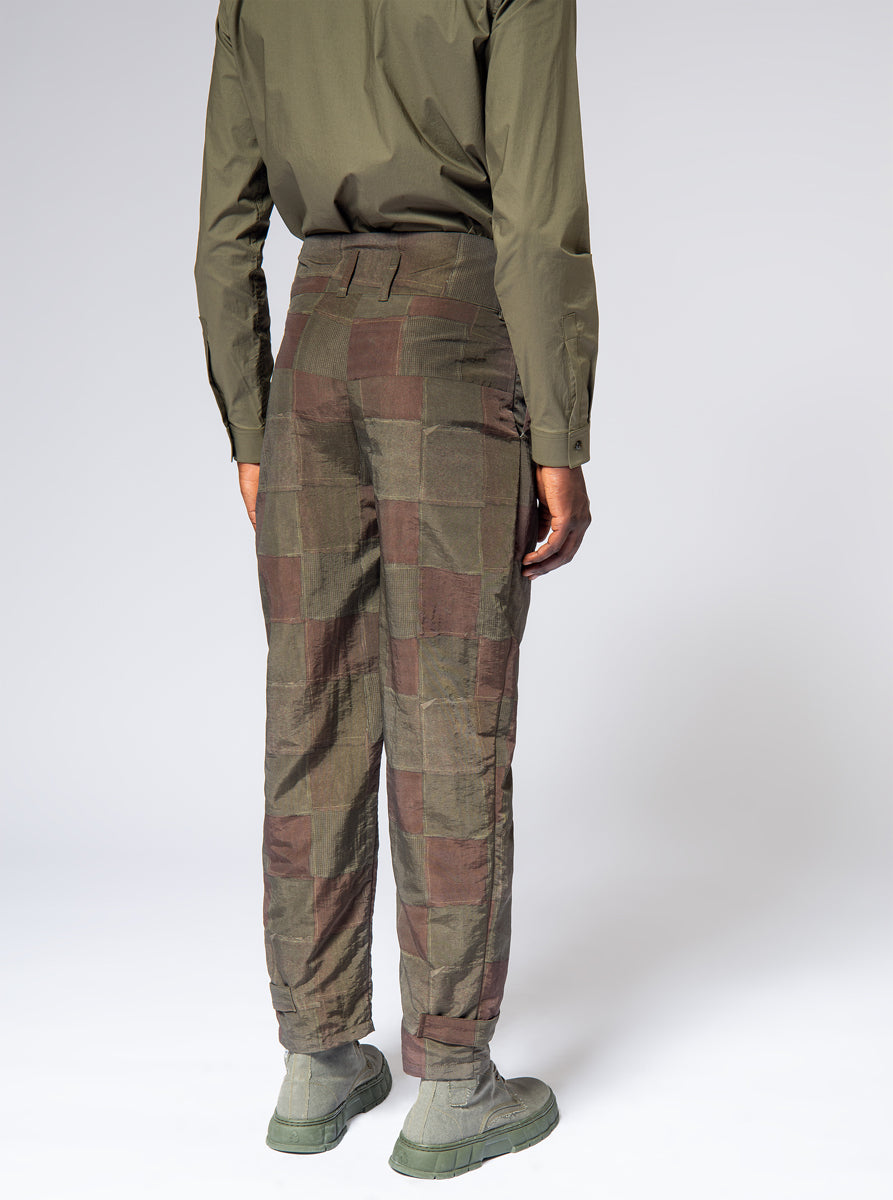 high waisted nylon trousers in green brown patchwork print