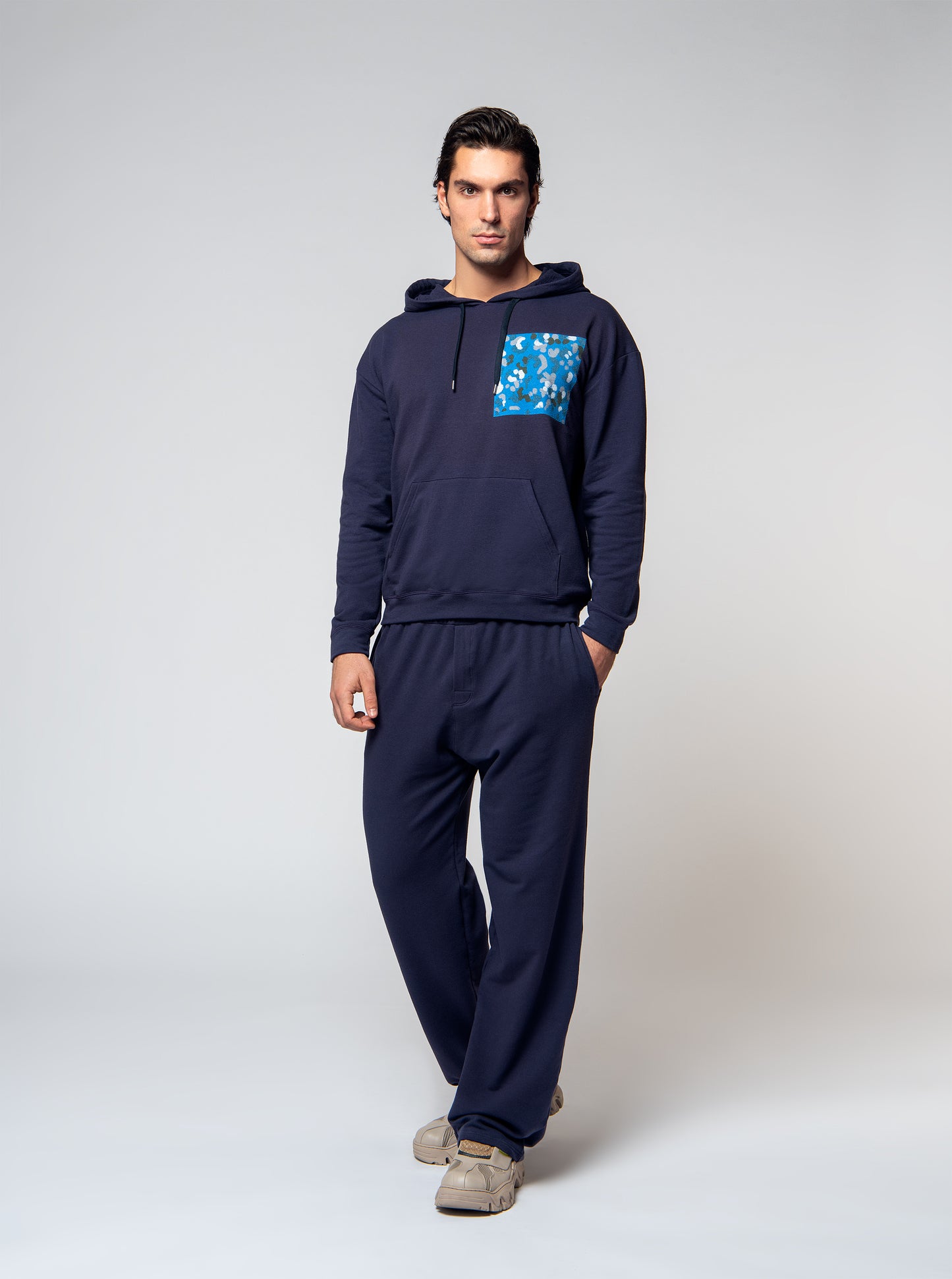 navy blue moleton hoodie and trousers